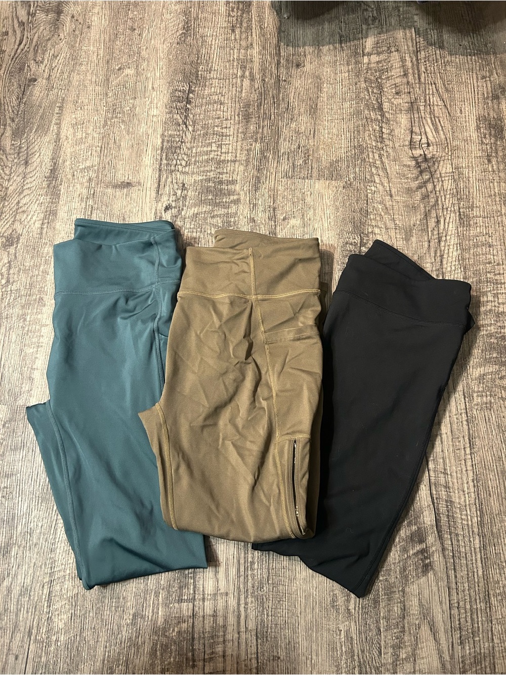 Fabletics Leggings Trio — Teal, Olive, and Black